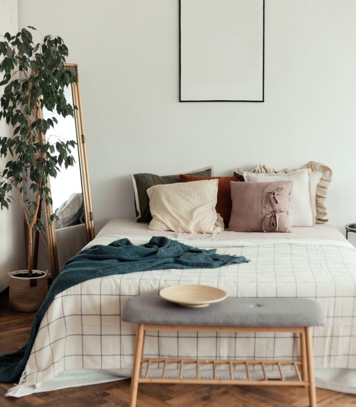 light-bedroom-rustic-interior-with-natural-materials-wooden-furniture-and-cotton-textiles-mock-up.jpg